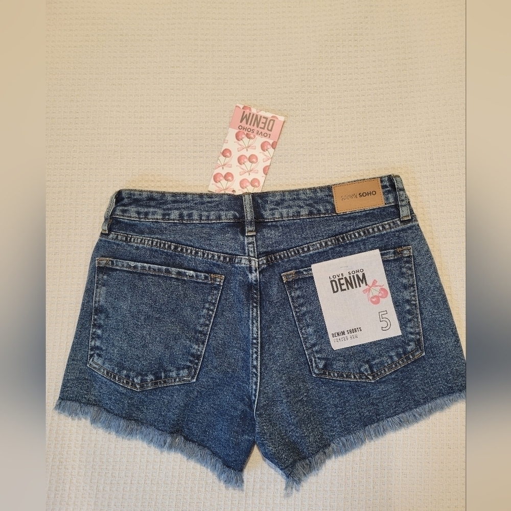 Women's Distressed Blue Jean Shorts - Picture 5 of 8